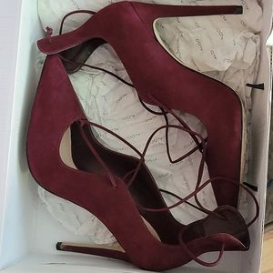 Used burgandy lace up Aldo pumps